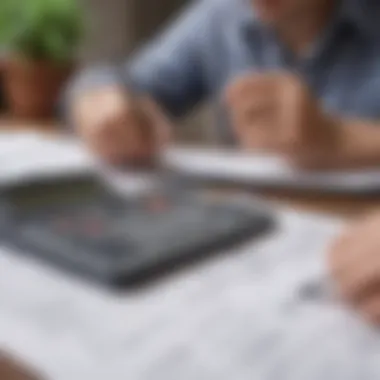 Evaluating Financial Options A person reviewing financial documents with a calculator, contemplating account choices.