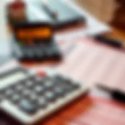 A calculator and financial documents detailing mortgage rates